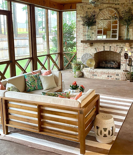 Screened Porch with fireplace, designed by Lauren Egger Designs.